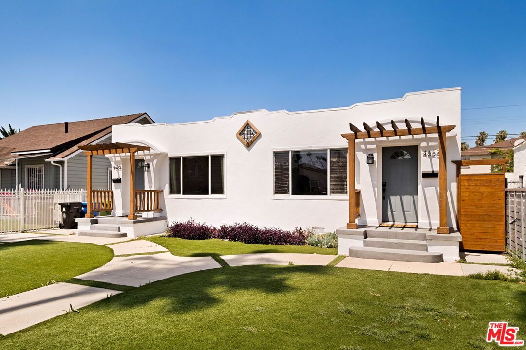 Spanish-style duplex exterior at 4623 6th Ave, Park Hills Heights, Los Angeles